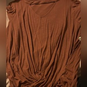 orange twist top with cutout at top